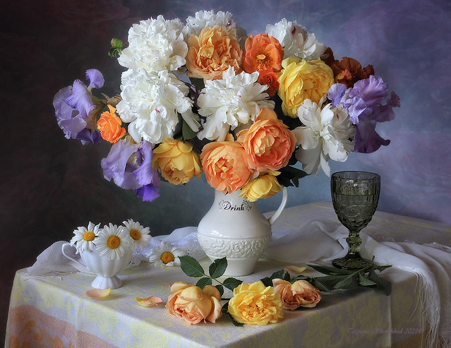 Still life with bouquets of garden flowers