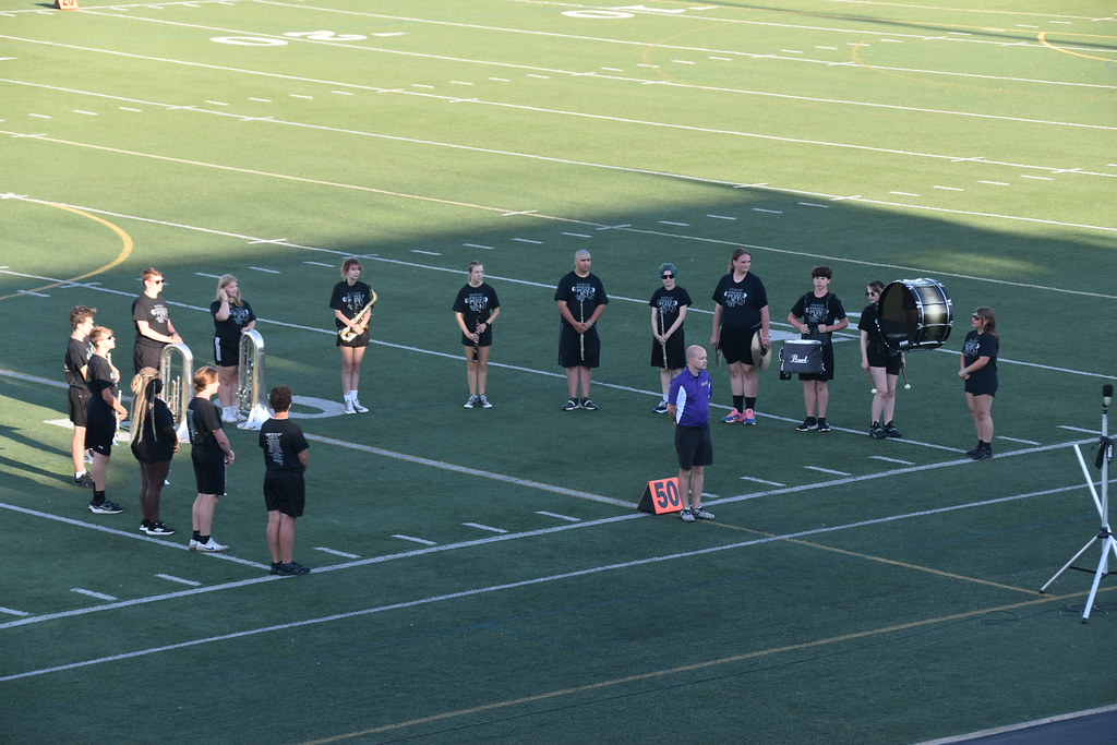 Bellbrook Marching Band members preparing to perform the national anthem