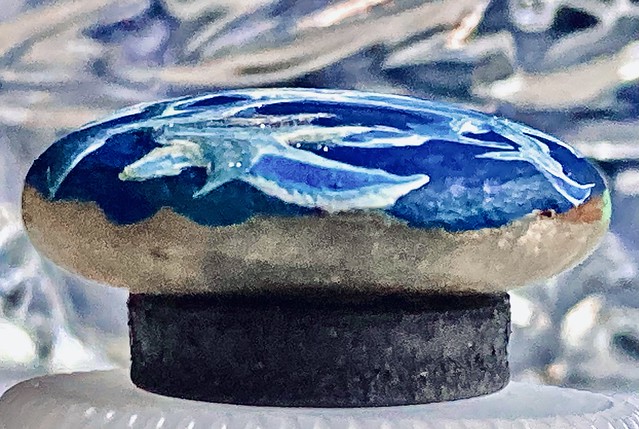 painted rock magnet, on edge