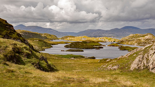 Scudding along near Scadabay by odell_rd, Rain was never far away during our two weeks in the Outer Hebrides, but it gave us some interesting