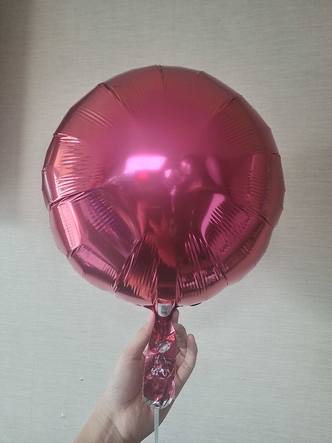 Anagram 18-Inch Burgundy Round Foil Balloon Inflated with Helium
