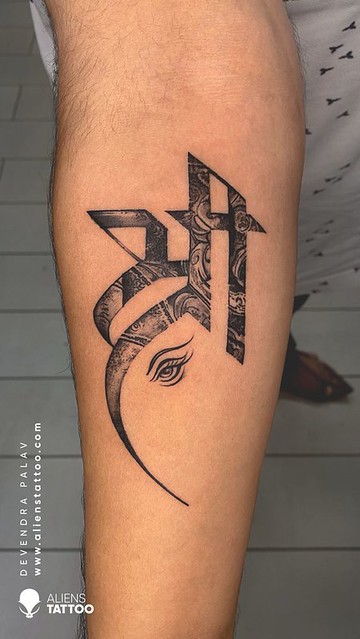 Divine Script: Ganesha's Inspiring Calligraphy | Alien Tattoo Studio
