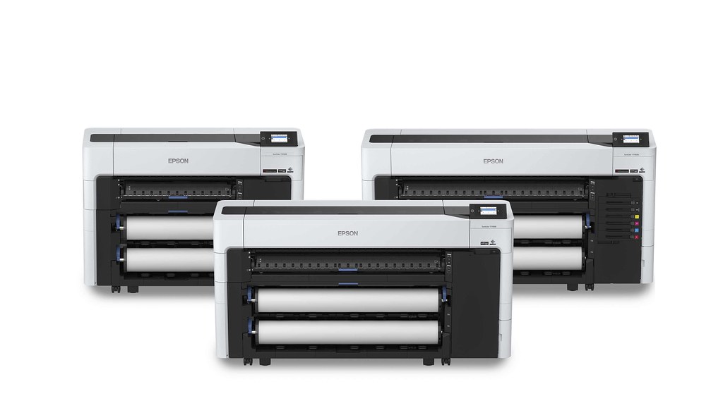 A picture containing printer, duplicator

Description automatically generated