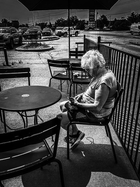 It’s not just for millennials. Windsor, ON. #photo of the day #Windsor #Starbucks #black and white #monochrome #iPhone photography #iphoneography #iPhone 14 Pro Max #grandma #cellphone #texting #faces in coffee shops