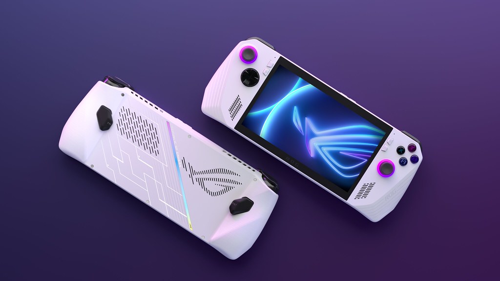 A white gaming device with a screen on it

Description automatically generated