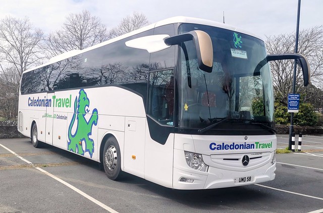 This Tourismo is wearing a green version on the Caledonian Travel livery with the Go Green... Go Caledonian slogan. it's parked in the coach bays at Coppin's Bridge Car Park while touring the Isle of Wight. - UMO 58 - 13th April 2022
