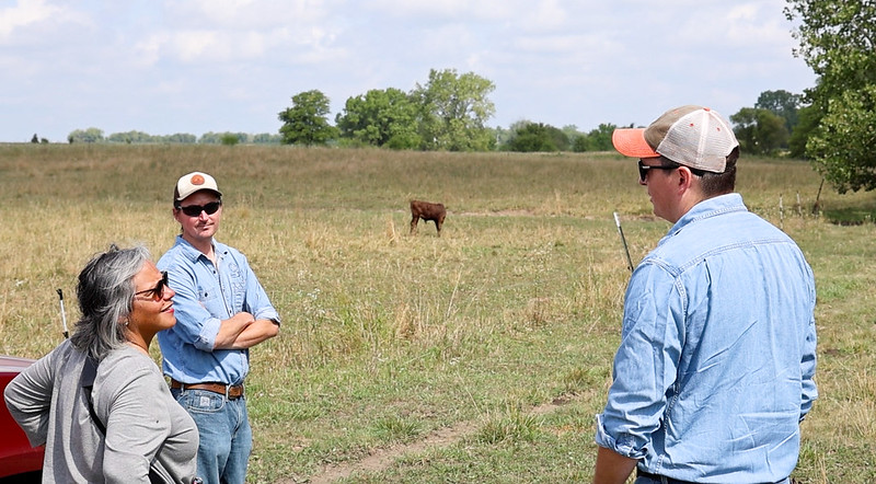 Congresswoman Kelly surveys cattle at the Cow Creek Farm in Paxton, IL