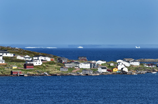 Red Bay, Labrador With Three Large Icebergs In The Background