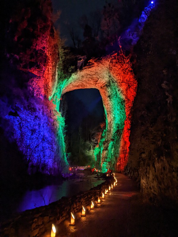 photo of the Natural Bridge at night with lights