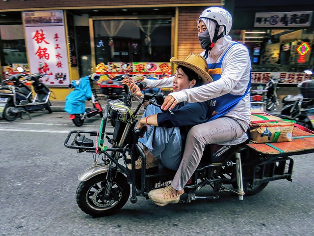 Couple on scooter