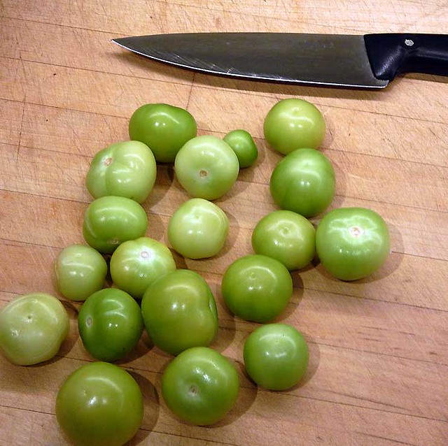 tomatillos stripped of their husks to make Salsa Verde