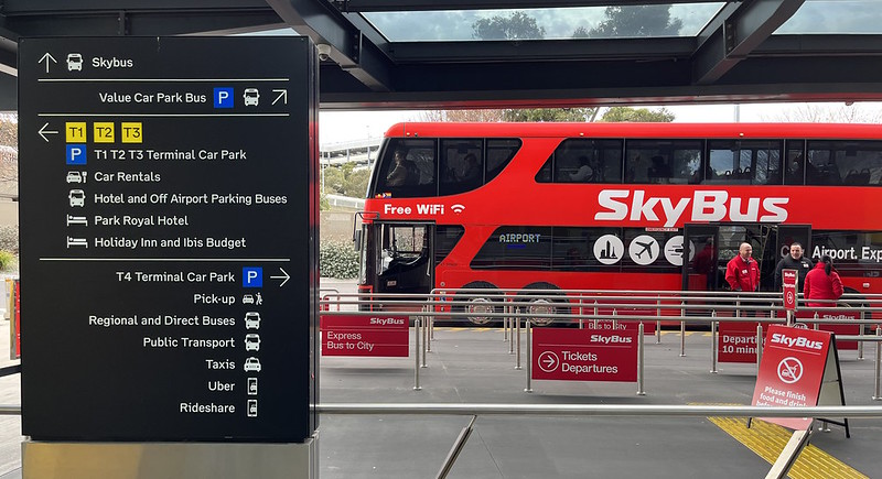 Signage and a Skybus at Melbourne Airport