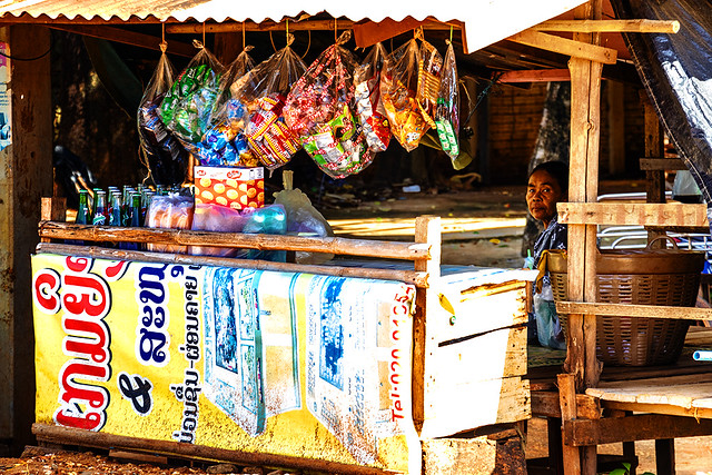 Woman selling soft drinks and a few snacks on 8-16-23--Pakse copy