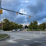 View northeast of intersection at N. Monroe Street and Gwynns Falls Parkway, Baltimore, MD 21217 Photograph by Eli Pousson, 2022 July 28.