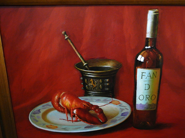a still-life painting of a lobster and the local wine in a winery in Penafiel, Spain