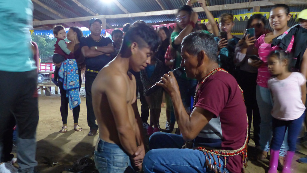 man performs spiritual cleansing ritual in Ecuador