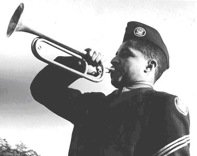 photo of CCC member playing a bugle
