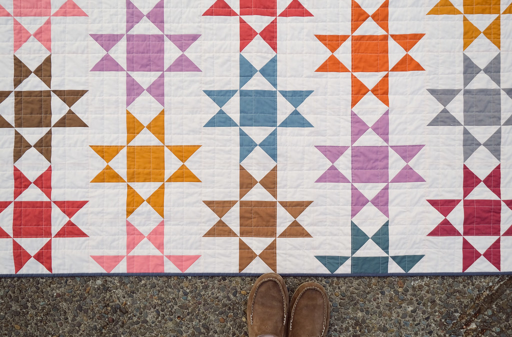 The Zelda Quilt pattern uses a beautiful collection of solids from Art Gallery Fabric's Pure solids to make this traditional, fat quarter friendly pattern feel a little more modern.