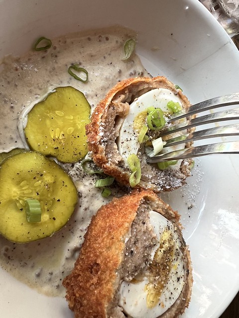 Scotch Eggs - soft-boiled farm egg, roasted garlic sausage, whole grain mustard mayo, bread & butter pickles - MARKET GARDEN BREWERY 1947 West 25th Street, Cleveland, OH. 44113