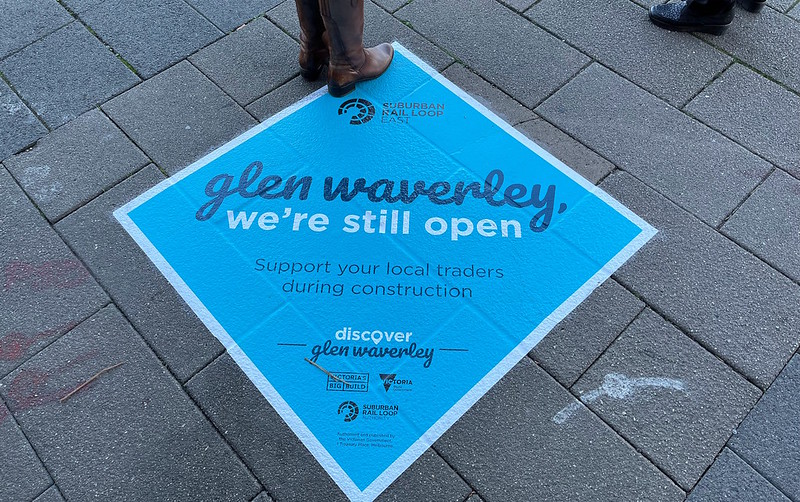 Suburban Rail Loop - "We're still open" signage at Glen Waverley