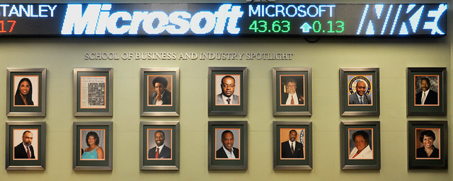 Some of the SBI's Spotlight Portraits on Display in the Bull & Bear Lounge Underneath Microsoft's Stock Price of 43.63 on (02/20/2015) ::: Today (08/28/2023) the Price is 323.69