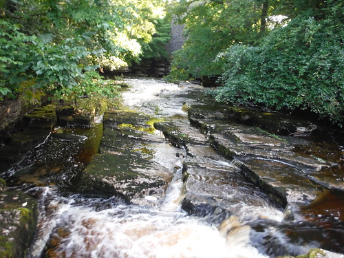 "The rock here has been sculpted by thousands of years of water and gravel action into deep holes, channels and drops..." SWC Walk 416 - Nine Standards (Kirkby Stephen Circular or to Garsdale)