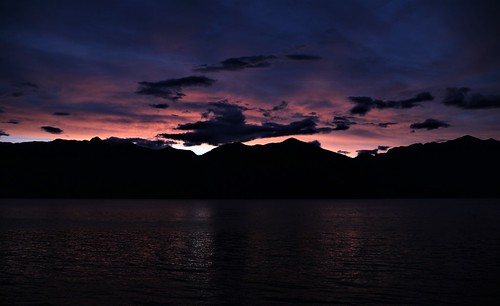 Twilight At Lake Maggiore, Luino, Varese, Lombardy, Italian Republic. by millicand@rocketmail.com, Twilight is light produced by sunlight scattering in the upper atmosphere, when the Sun is below the