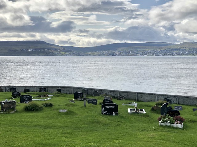 Cemetery and distant view of Streymoy, Nólsoy, Faroe Islands