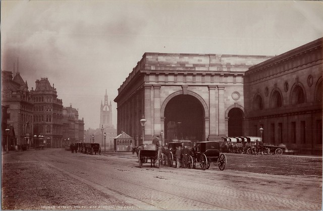 Newcastle Central Station & Neville Street as seen c1886 with a shelter for the cab drivers in front of the portico.