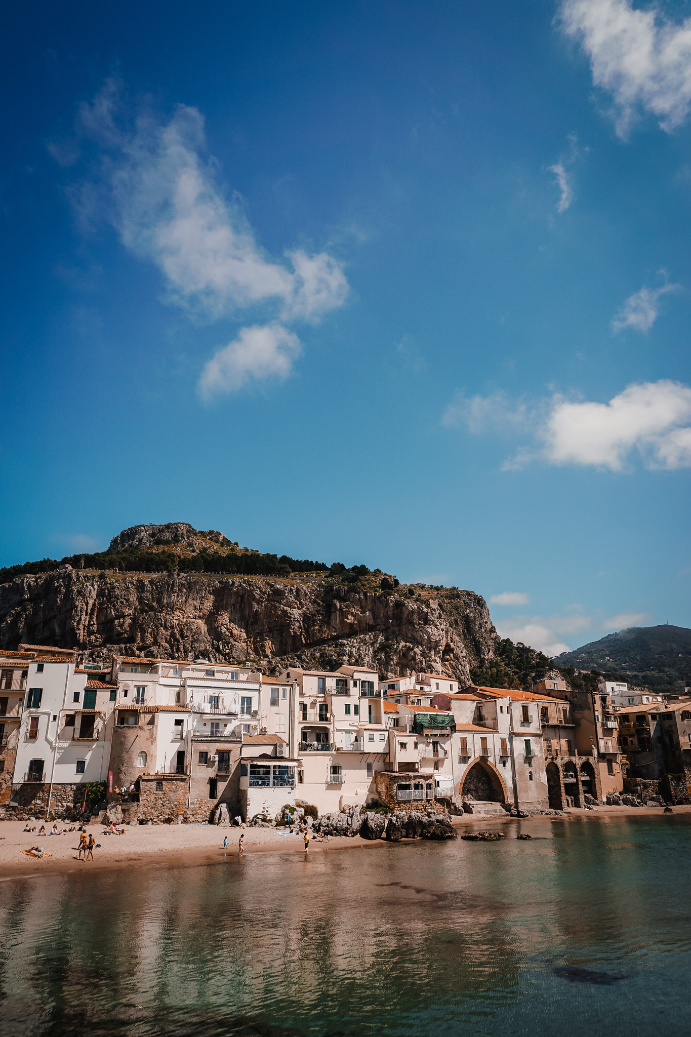 Old Town of Cefalu with La Rocca in the background | Explore the Picturesque Town of Cefalu | Cefalu Sicily Travel Guide | What to See, Do and Eat in Cefalu | Discover the Best Things to do in Cefalu, Sicily, Italy | Sicily Travel Tips | Visit Sicily