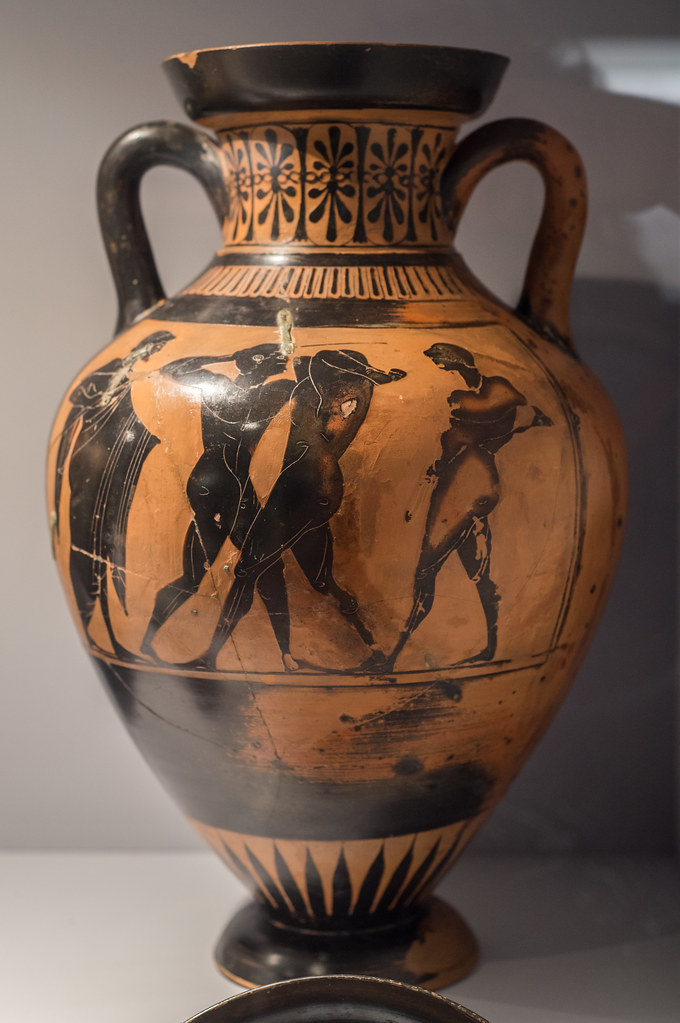 Athenian Black Figure pseudo-Panathenaic amphora with boxers between trainers, 1