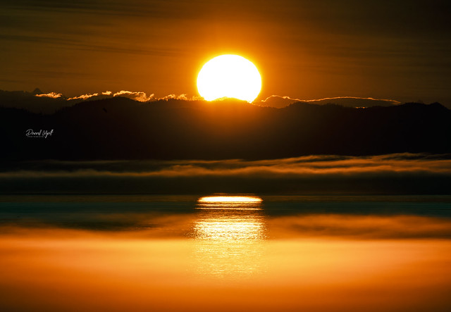 Sunrise Over Land, Sea, and Cloud
