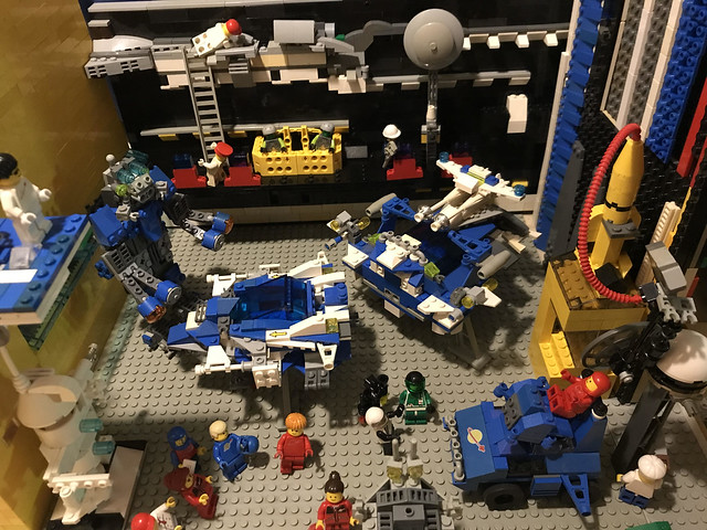 LEGO Classic Space: Bluebird is talking maniacally while the pusher-bot is waiting and so is the space-police he needs his spaceship and actually the whole Base ( AFOL diorama Sci-fi Toy Vignette with minifigures, robots and futuristic vehicles ) Hobby