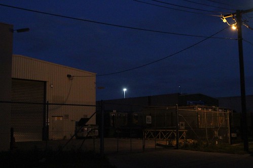 'Watchman' security lighting shine on private property from utility owned power poles
