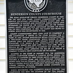 Henderson County Courthouse (Athens, Texas) Historical marker for the Henderson County Courthouse in Athens, Texas.  The plaque reads:

Henderson County Courthouse - The Texas Legislature created Henderson County in 1846. For the next few years, county commissioners met at various locations, including private homes and the communities of Buffalo and Centerville. Samuel Huffer later determined the center of the county was on the Thomas Parmer survey, and Matthew Cartwright secured 160 acres for the new courthouse. In 1850, the county seat moved to Athens, which was incorporated in 1856. County commissioners hired John Loop to construct a log courthouse. It served as the court building for 11 years. In 1860, William Warenskjold began construction on a two-story frame courthouse, which burned in 1885, leaving only the district and county clerk buildings standing. C.H. Hawn &amp;amp; Co. constructed the next courthouse, which was used until 1913. That June, with a design by L.L. Thurmon &amp;amp; Company of Dallas, the commissioners court approved the bid of L.R. Wright &amp;amp; Company to build a new courthouse on the square. Accepted by the court in January 1914, the Henderson County Courthouse exhibits a Classical Revival design. The building is comprised of three floors above a basement, and features a central dome and four three-bay pedimented entries with Tuscan columns. The cross-axial plan is formed from a central block with single bays projecting from each corner. Original detailing includes marble stairways and wainscoting on the interior. Since becoming the county&#039;s public center, the courthouse has been the location of the &amp;quot;Old Fiddlers&amp;quot; contest and other events. Today, memorials and tributes to Henderson County veterans, leaders, residents and history are located on the square. Recorded Texas Historic Landmark - 2002