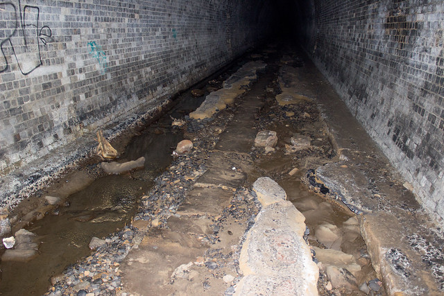 Flowing water on ground of abandoned railway tunnel, Otford