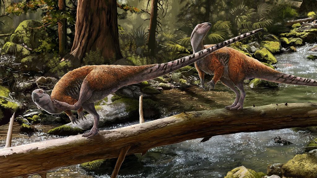 Artist's illustration of dinosaurs walking on a log over a river