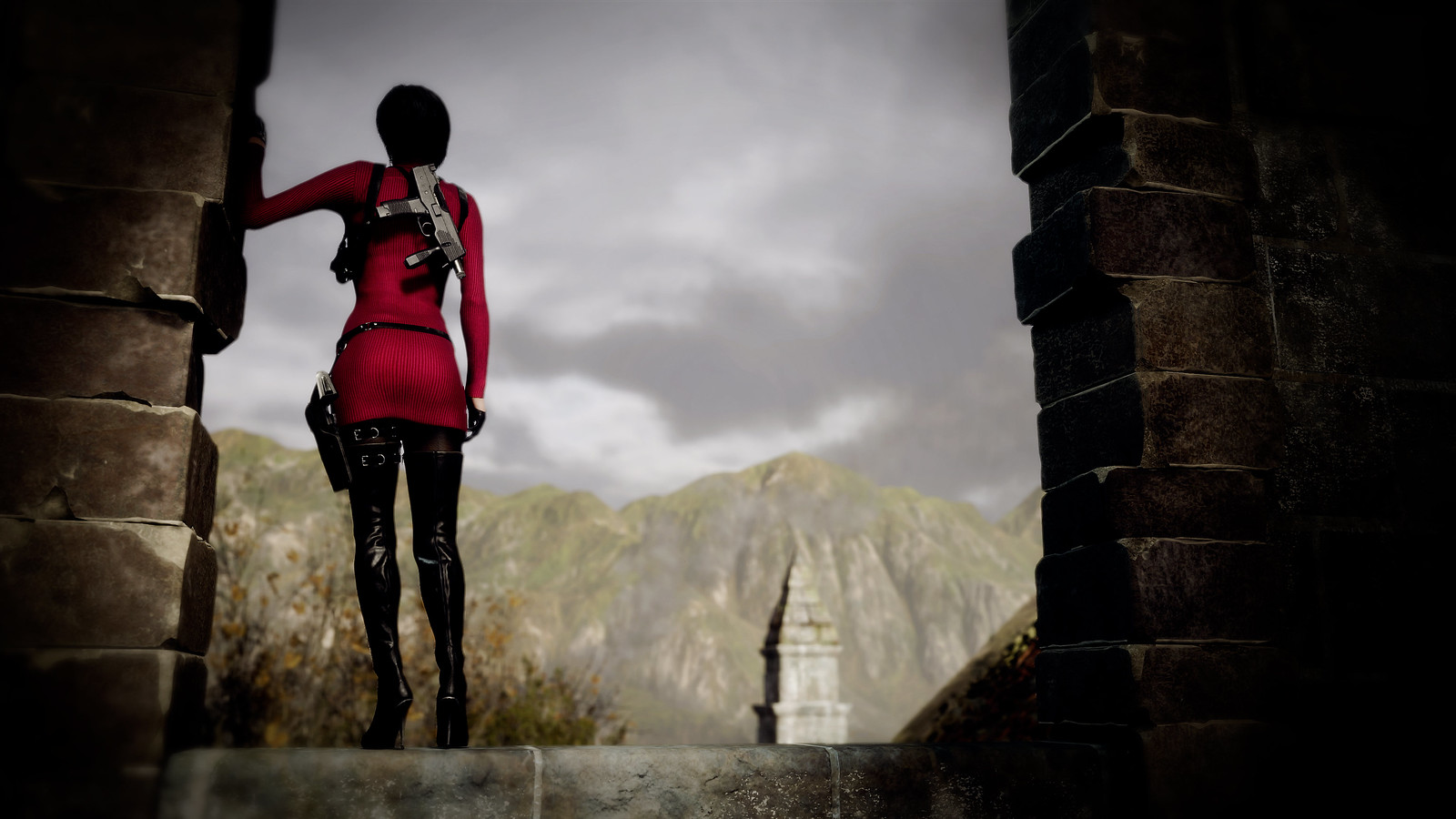 With her back to the camera, Ada Wong stands atop a wall, looking out over the surroundings below.