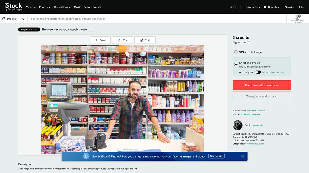 5.-Color-image-of-an-ethnic-shop-owner-in-Amsterdam.-He-is-standing-in