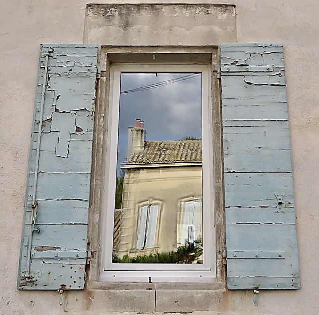 Another bluish, old window. At least, this one still works as a mirror.