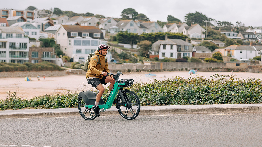 Man on e-bike cycling in Newquay. 