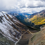 From winter to fall Ophir Pass in Colorado, with winter conditions at the top and fall colors lower down