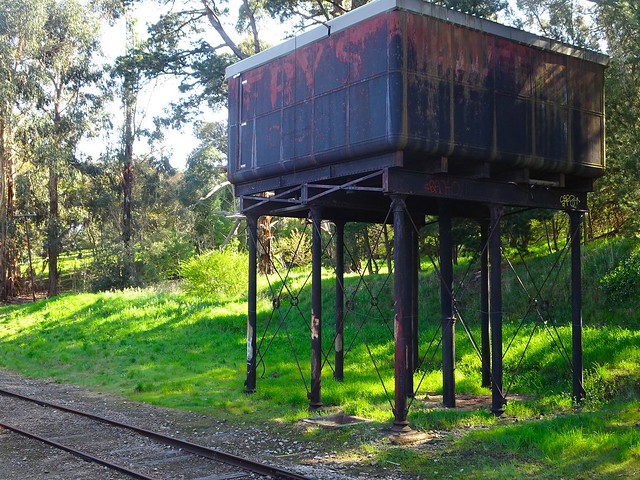 Mount Barker.  The old water tank for steam engines with advertising for Frys on the side. Station now departing place for Steamranger trains to Victor Harbor.