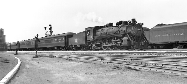 Rock Island ALCO bullt 1910 P-33 class 4-6-2 Pacific steam locomotive 933 is seen leading an inbound city commuter train past the ERIE 14th Street Freight House in Chicago, Illinois, ca 1940's