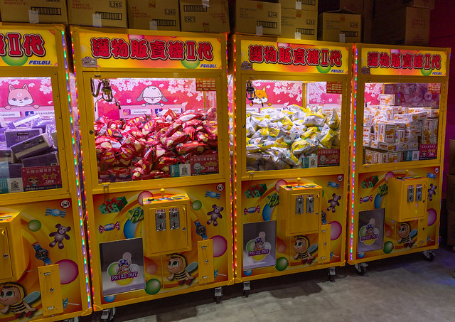 Claw machines with toys at a game arcade, Ximending district, Taipei, Taiwan