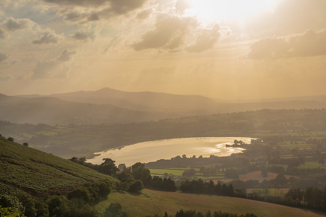 Hazy Evening View Of Llangorse Lake From Llangorse Mountain