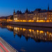 Beautiful reflection of the Conciergerie at sunrise