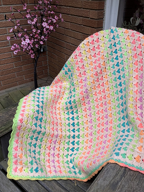 While Cathy (MCatherineL) rarely uses yarn from my shop, and I rarely see her at the LaSalle or Essex groups since I can’t get to them, she knits and crochets beautifully. This is her Heart Blanket by Marina Nikolaidou.