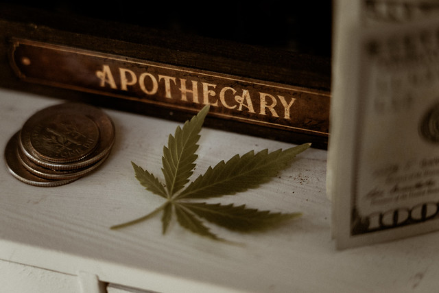 Marijuana leaf on table