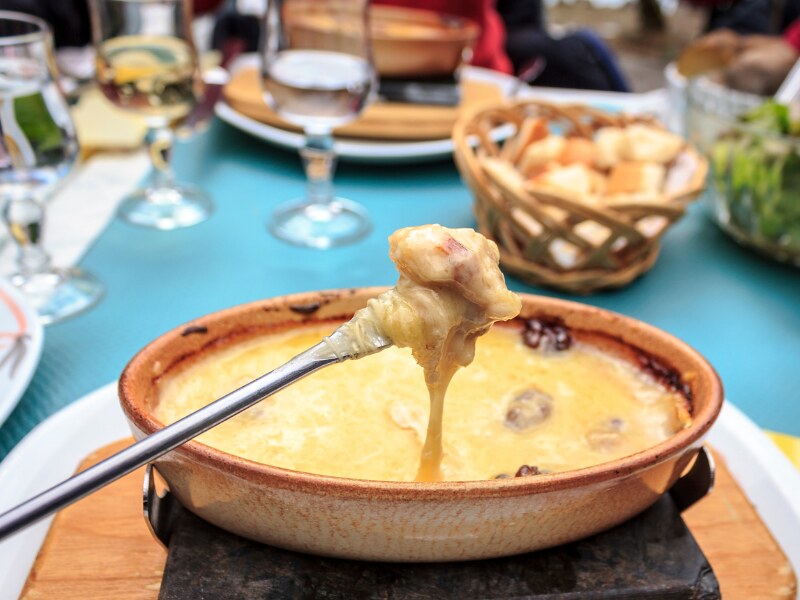 things to do in Lauterbrunnen winter - Swiss cheese fondue cooking class